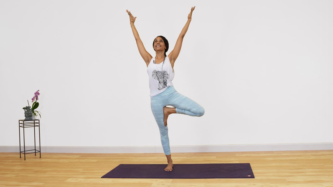 Work on your balance with this standing yoga flow | Well+Good