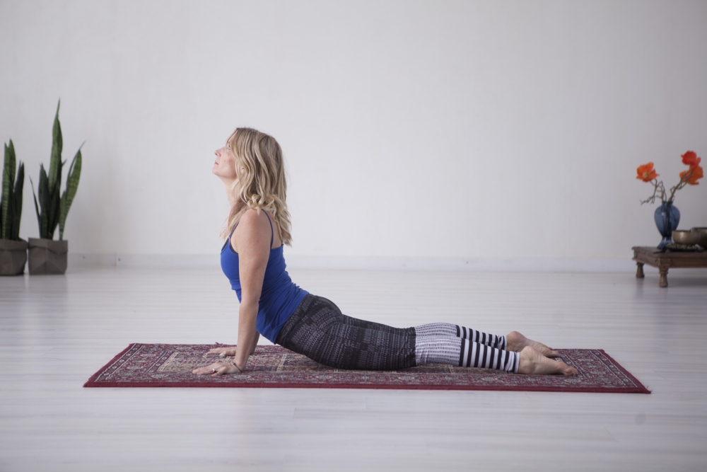Premium Vector | Yoga cobra pose or bhujangasana woman practicing  strengthing yoga pose engraved vector