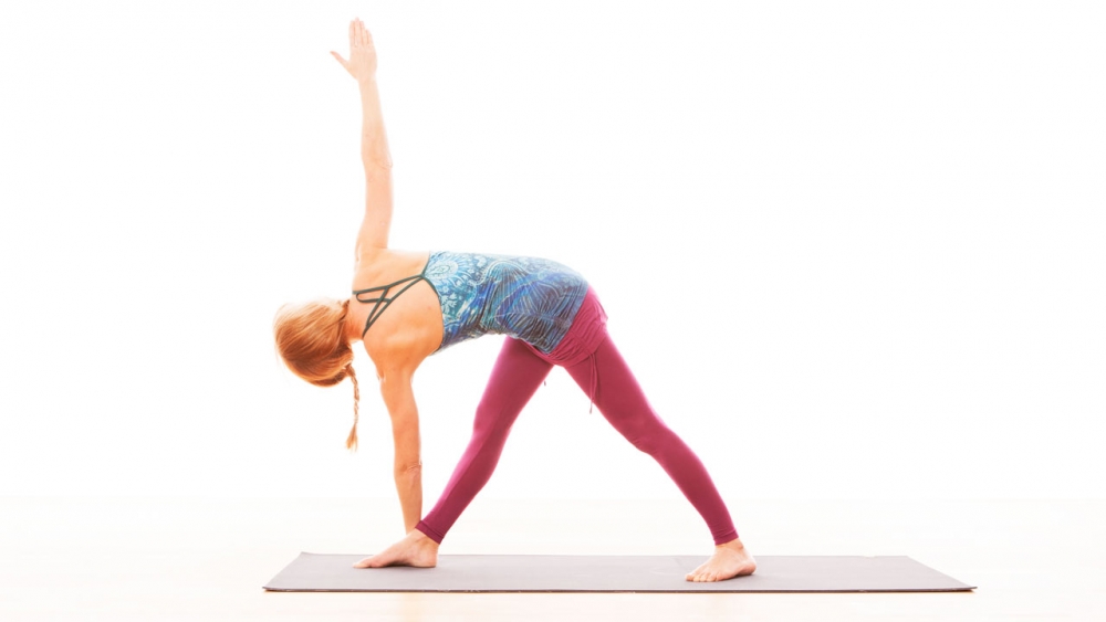 Soul Coast Yoga - Parivrtta Trikinasana or revolved triangle pose is an  exploration into the side body, strengthening legs, lengthening the spine  and improving our depth of breath. Explore today with our