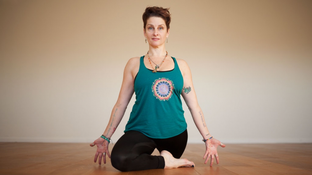 9 Fierce Kundalini Yoga Poses To Light Your Inner Fire