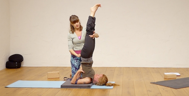 Shoulderstand modifications and variations with a bolster - Body Positive  Yoga