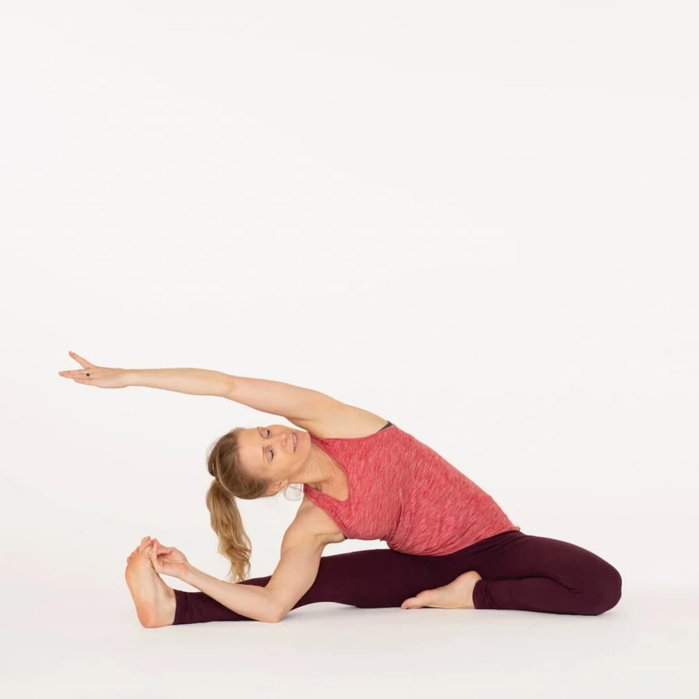Revolved Head to Knee Pose - Ekhart Yoga