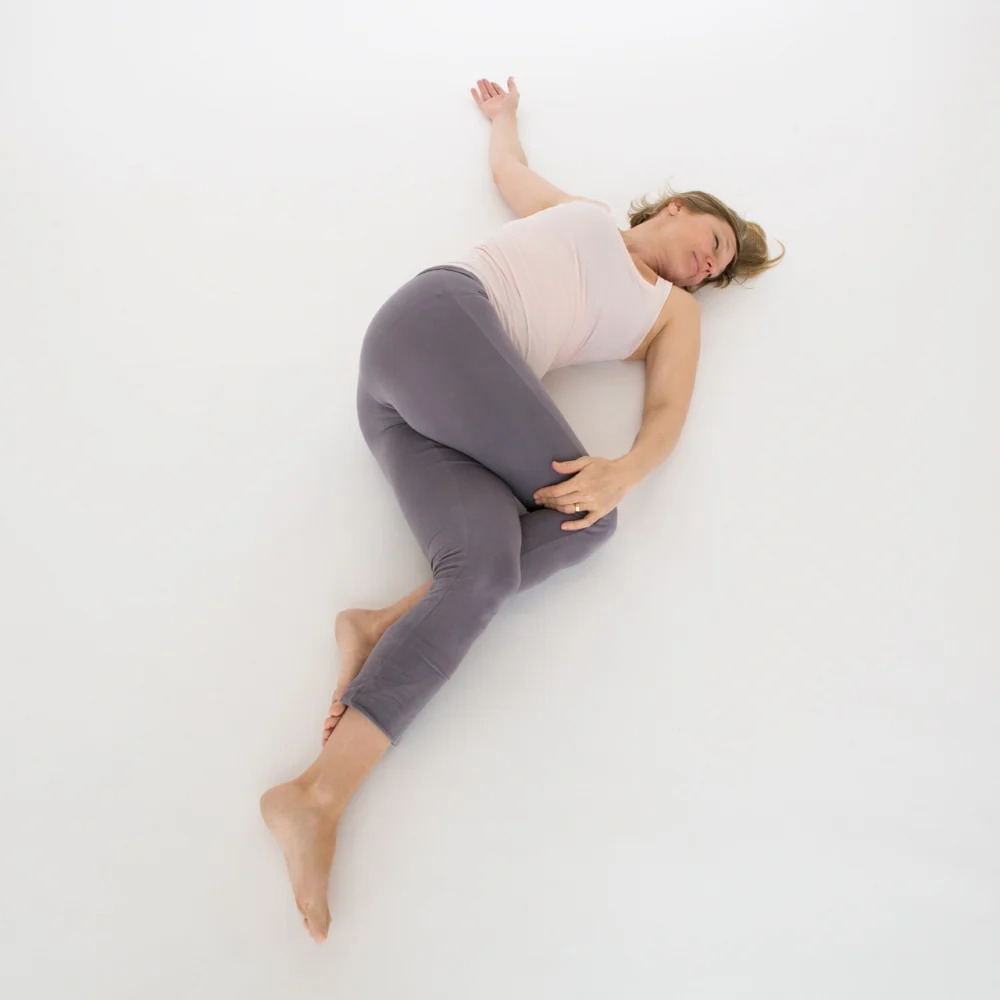 Supine Spinal Twist Pose (Supta Matsyendrasana) • Yoga Basics