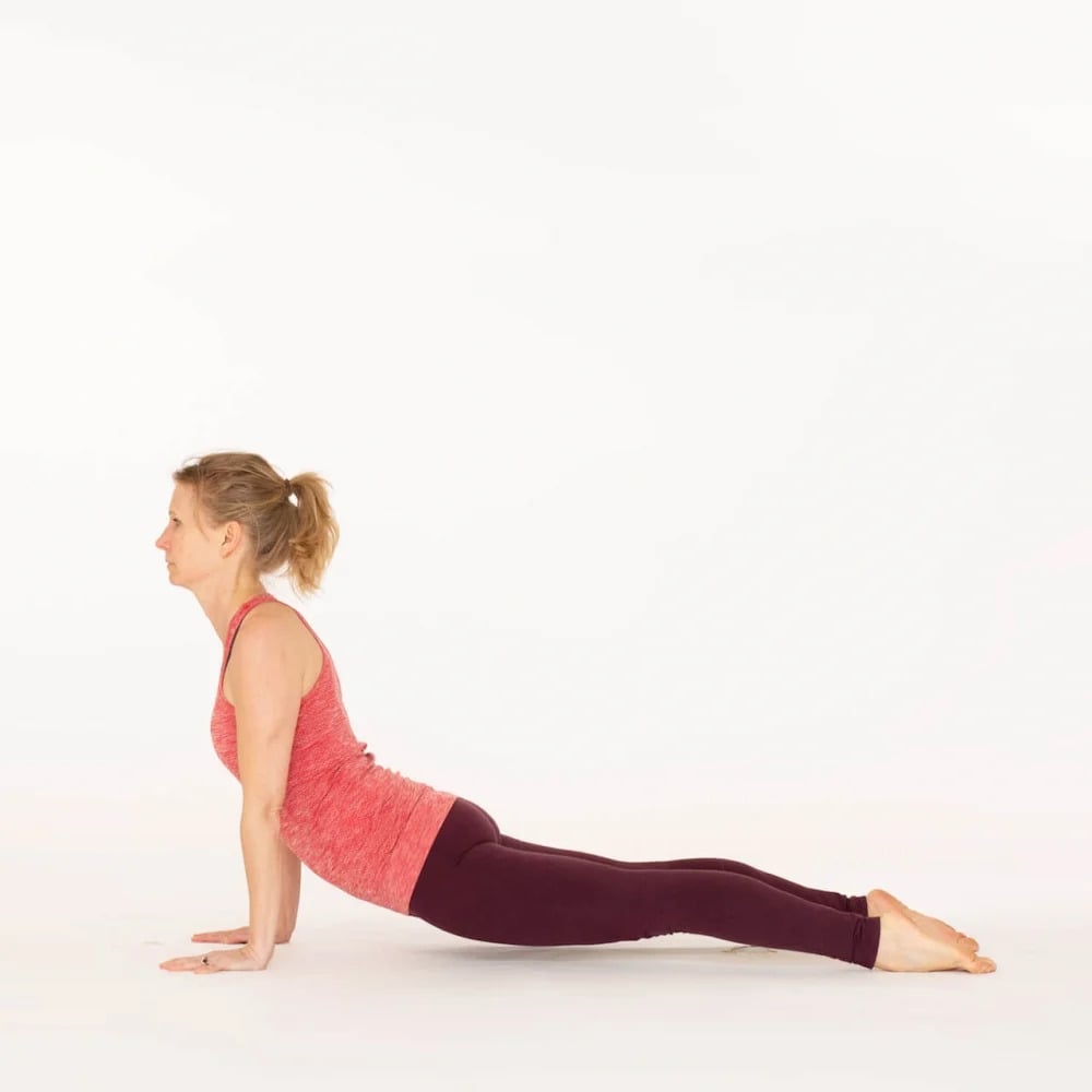 Upward Revolved Knee to Head Yoga Pose - Forte Yoga